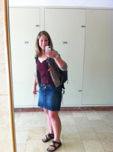 Young woman taking a mirror selfie