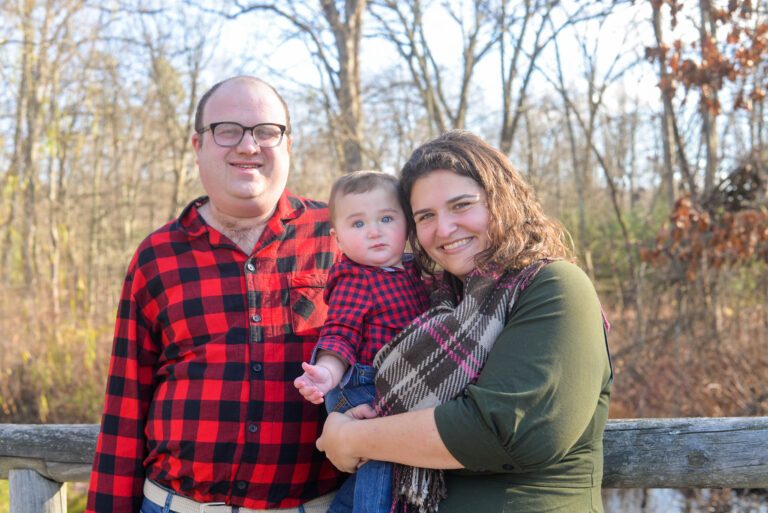 Samantha Vinokor-Meinrath with her husband and baby outdoors