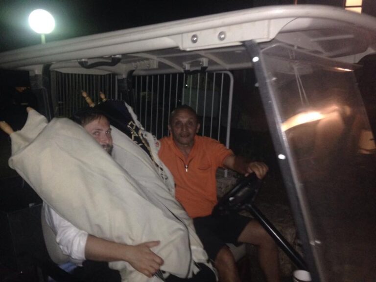 Carrying two Torahs Jeremy Borovitz