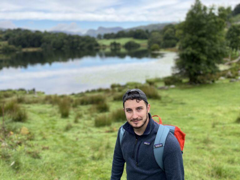 Jake Berger hiking by a lake