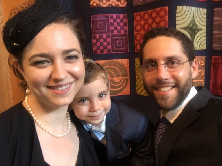 Becca Linden and Ari Hart with their son